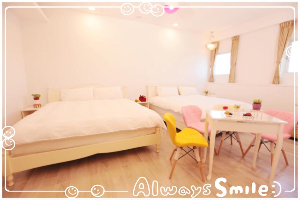 Postel nebo postele na pokoji v ubytování 兆億申襄采民宿1741 Zhao Yì Shen Xiang Cai Homestay 1741