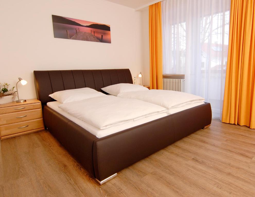 Postel nebo postele na pokoji v ubytování Garni Hotel Leitl GmbH