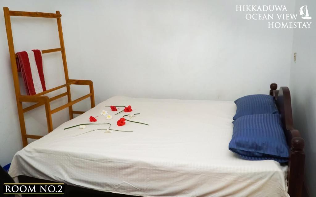 Postel nebo postele na pokoji v ubytování Hikkaduwa Ocean View Homestay