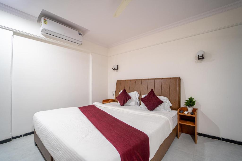 Postel nebo postele na pokoji v ubytování Hotel Kewal