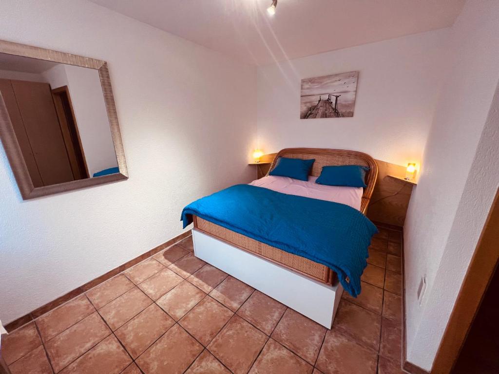 Postel nebo postele na pokoji v ubytování Gîte la Cigale