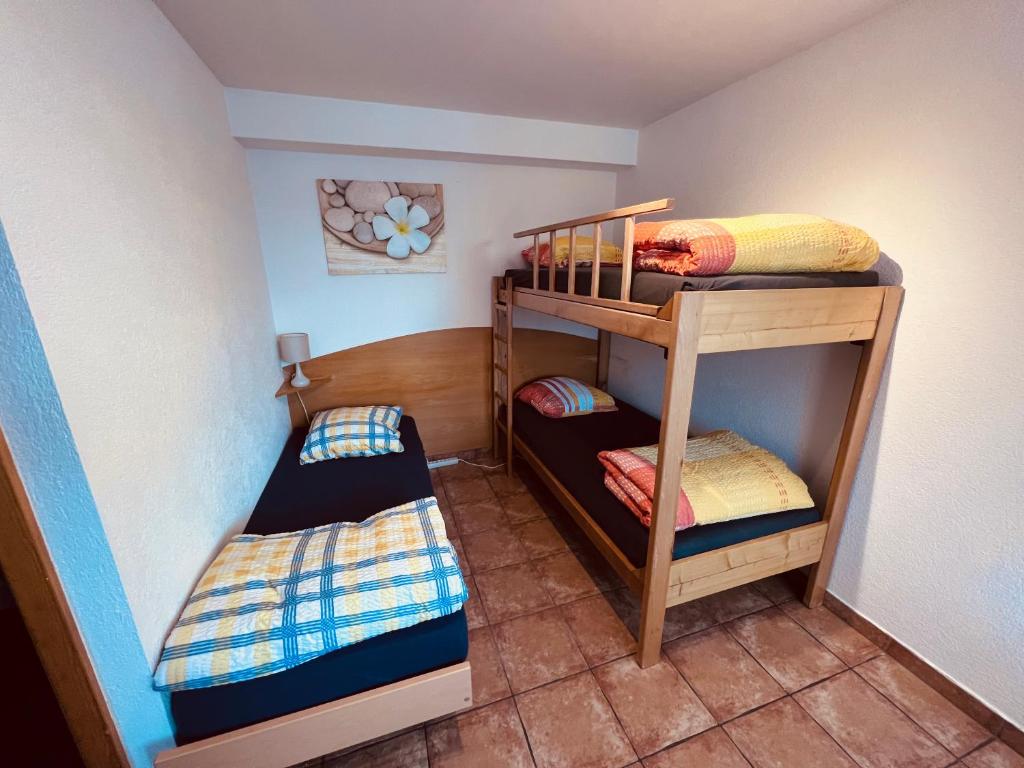 Postel nebo postele na pokoji v ubytování Gîte la Cigale