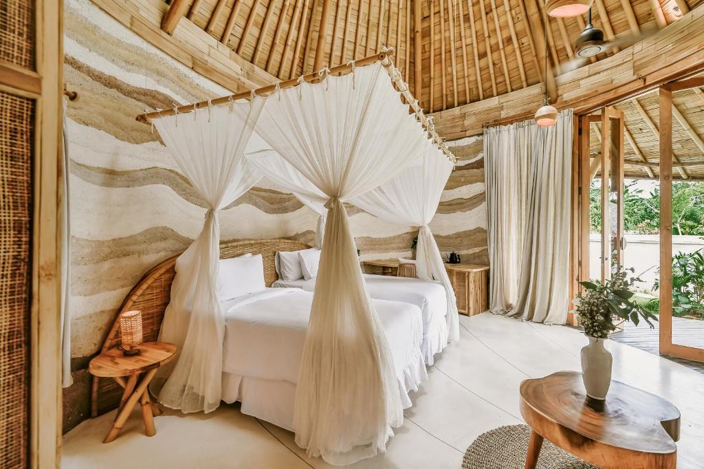 Postel nebo postele na pokoji v ubytování Solana Wellness Retreat