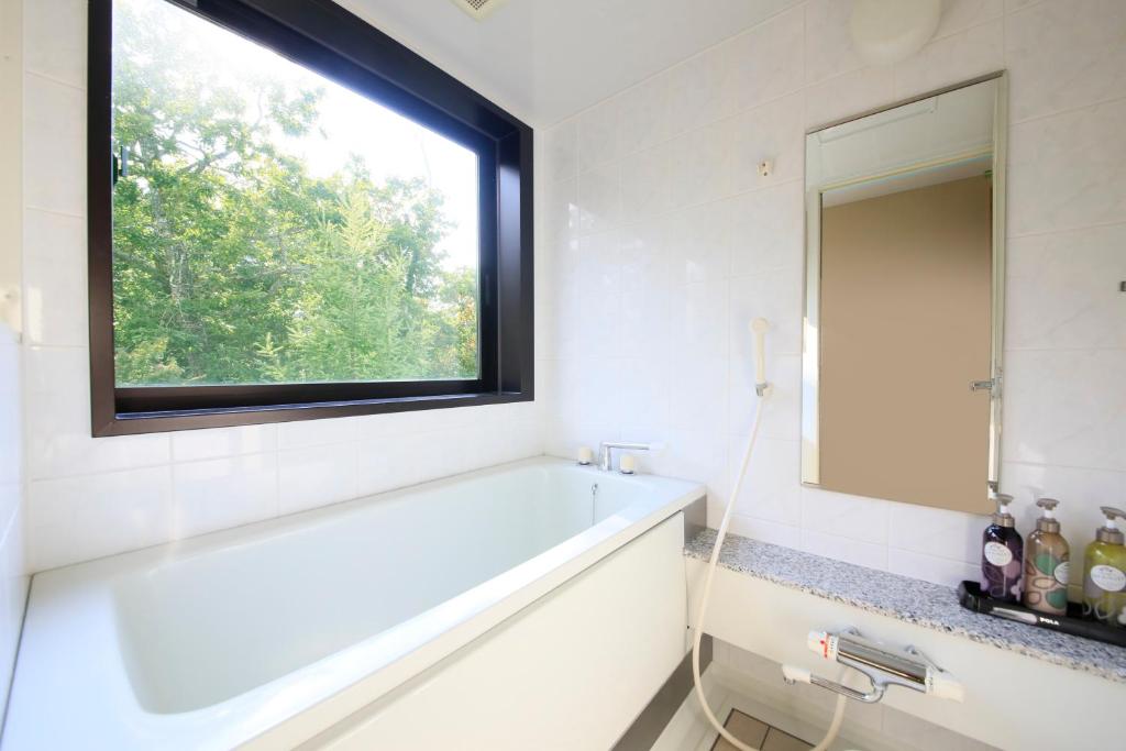 Koupelna v ubytování Hotel Shikisai