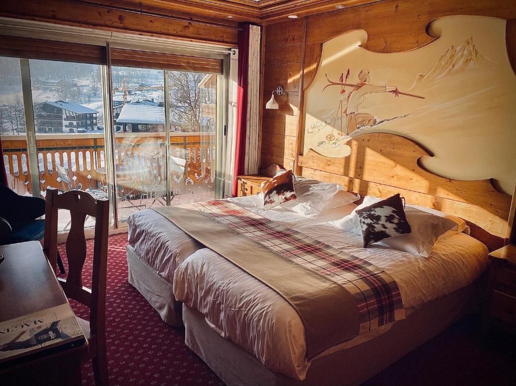 Postel nebo postele na pokoji v ubytování Hôtel Le Labrador 1971