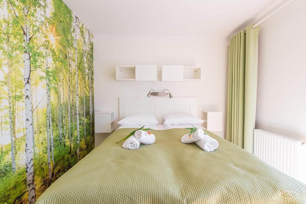 Posteľ alebo postele v izbe v ubytovaní Horyzont Apartamenty -Apartament Willa Karl- Blisko Centrum