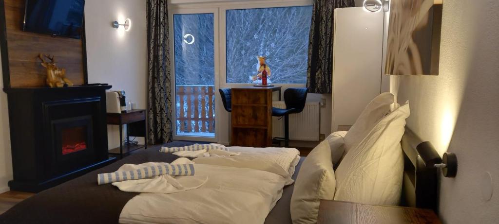 Postel nebo postele na pokoji v ubytování Waldpension Pfeiferhaus