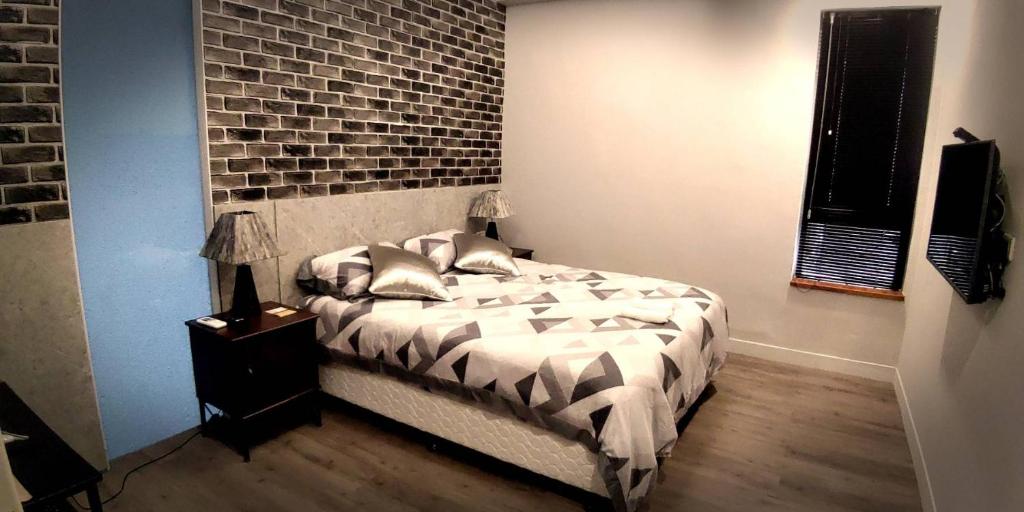 Postel nebo postele na pokoji v ubytování Mudan Gathering Homestay