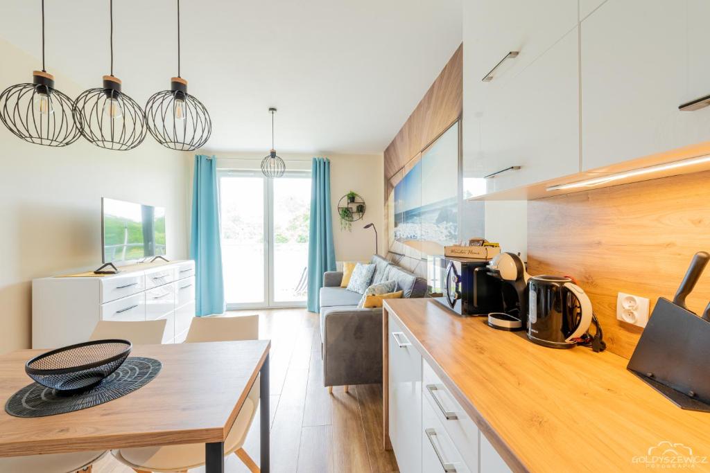 Kuchyňa alebo kuchynka v ubytovaní Horyzont Apartamenty-Porta Mare Baltica