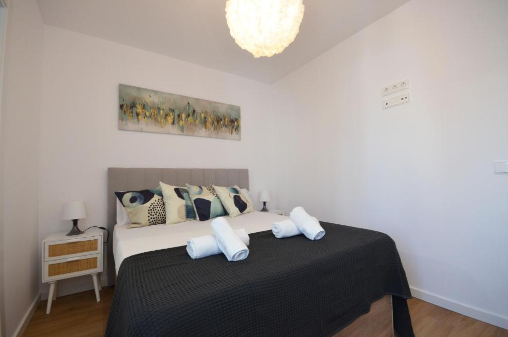 A bed or beds in a room at Golive Barques