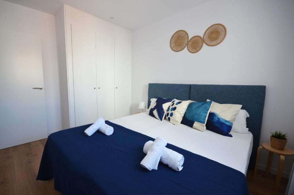A bed or beds in a room at Golive Barques