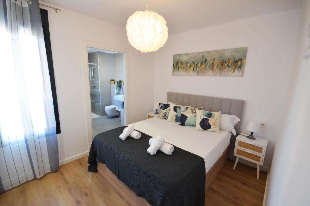 A bed or beds in a room at Golive Barques