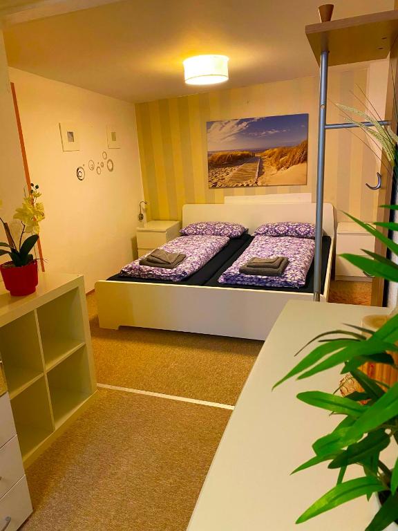 Postel nebo postele na pokoji v ubytování Ferienhaus Greiz