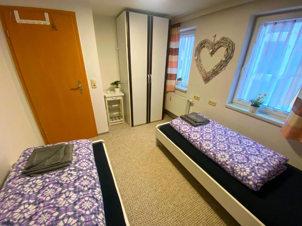 Postel nebo postele na pokoji v ubytování Ferienhaus Greiz