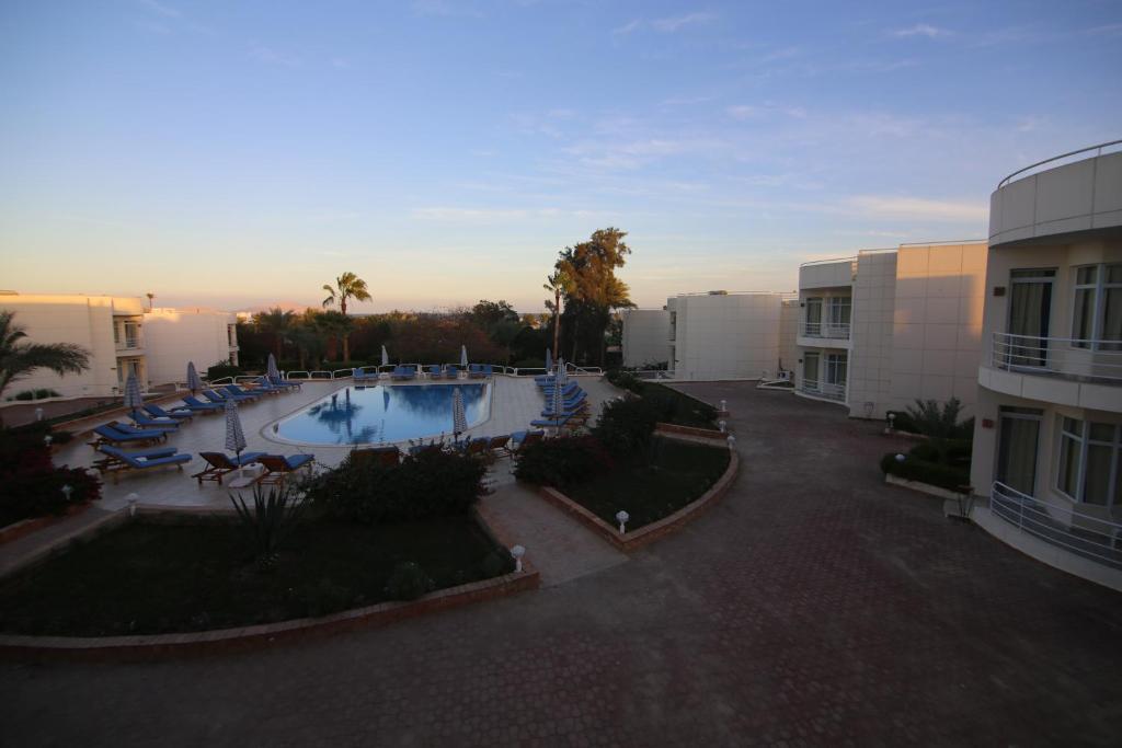 Bazén v ubytování Sharm Reef Hotel nebo v jeho okolí