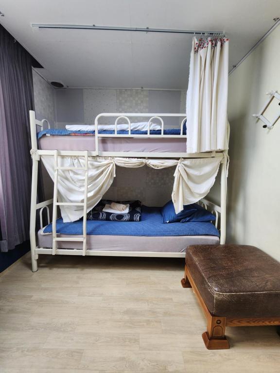 Postel nebo postele na pokoji v ubytování Aark House