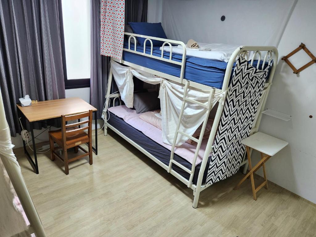 Postel nebo postele na pokoji v ubytování Aark House