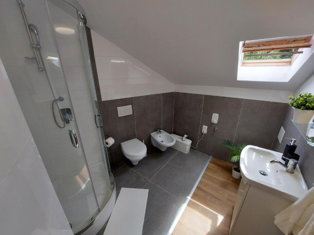 Kúpeľňa v ubytovaní Kedves Apartman