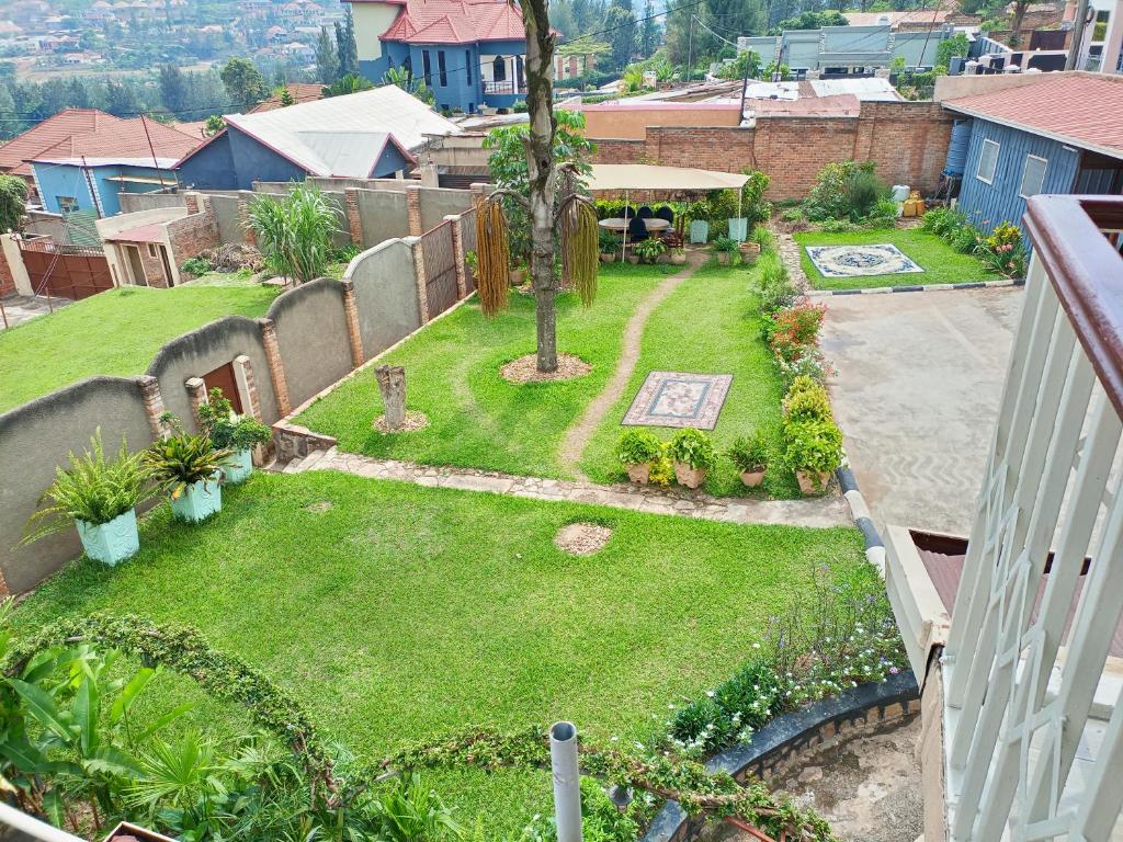 an aerial view of a backyard with a garden at Charming 2-Bed House in Kigali in Kigali