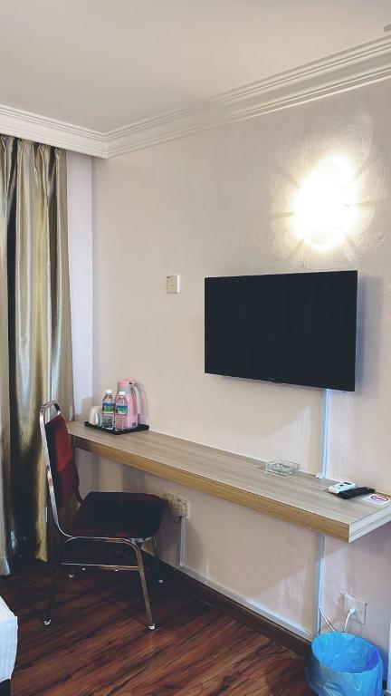 TV a/nebo společenská místnost v ubytování Hotel Ching Hua