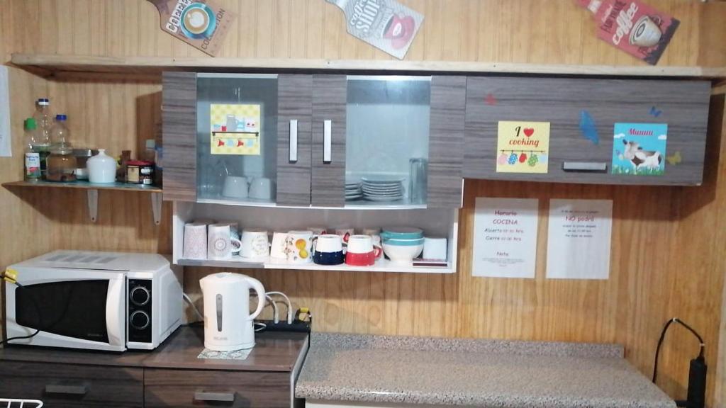 Kuchyň nebo kuchyňský kout v ubytování "Mi Hostal Tu Casa" Hostal Familiar SOLO EMPRESAS, TURISTAS y VIAJEROS Espacio para BICICLETAS y MOTOS