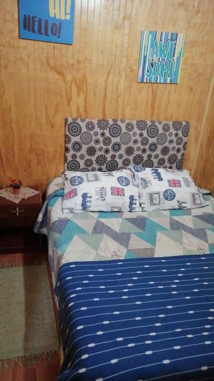 Postel nebo postele na pokoji v ubytování "Mi Hostal Tu Casa" Hostal Familiar SOLO EMPRESAS, TURISTAS y VIAJEROS Espacio para BICICLETAS y MOTOS