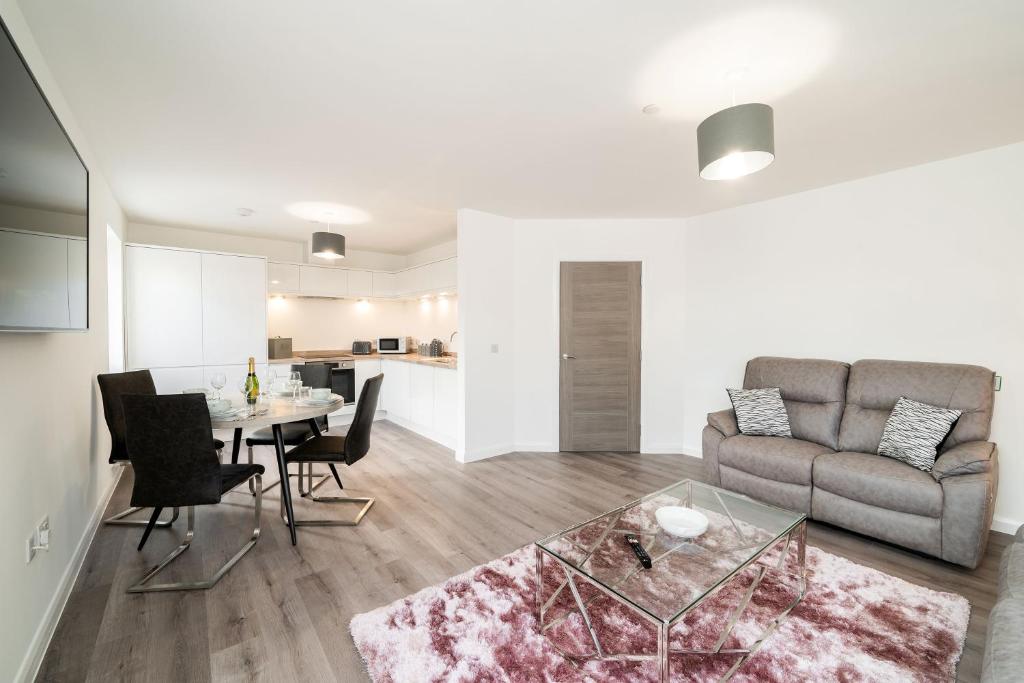 a living room with a couch and a table at South Esk Apartment 5 in Montrose