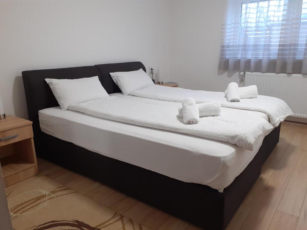 Postel nebo postele na pokoji v ubytování Apartman Nena