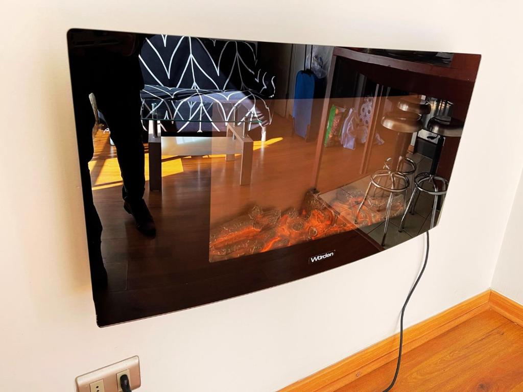 TV a/nebo společenská místnost v ubytování San Andres Suite Apartments