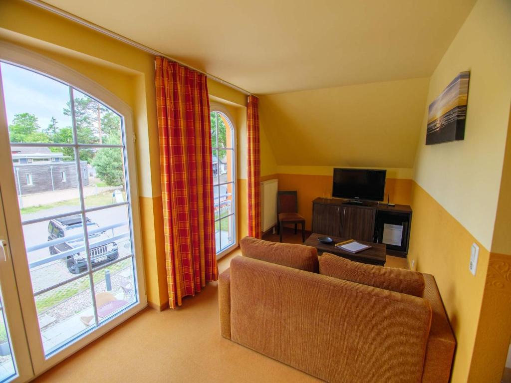 TV a/nebo společenská místnost v ubytování Hotel Strandburg Prerow