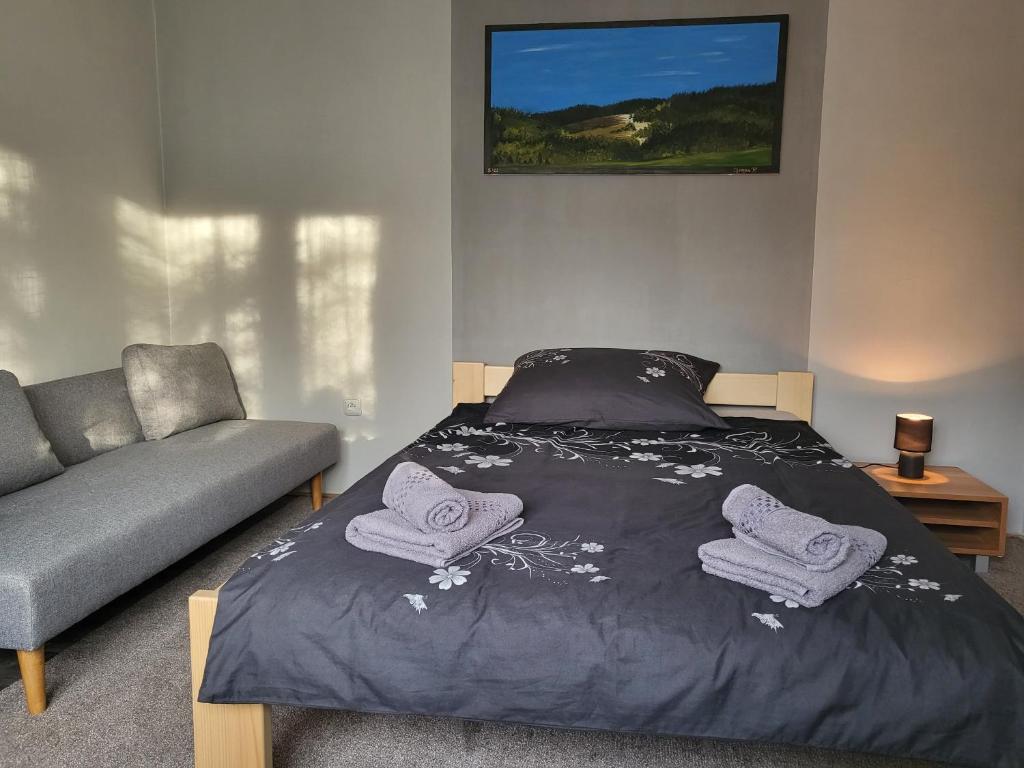 Postel nebo postele na pokoji v ubytování U strýčka Příhody