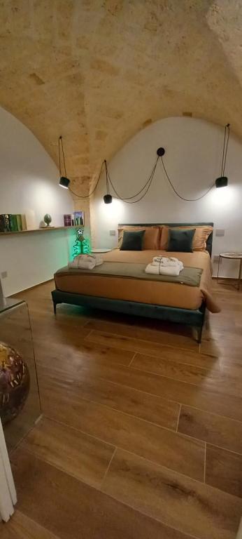 Łóżko lub łóżka w pokoju w obiekcie MATTEI LUXURY B&B
