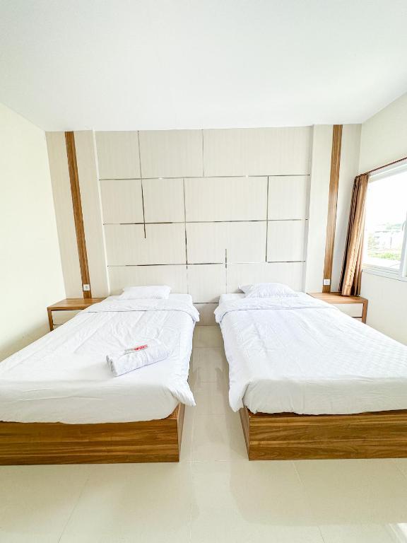 Letto o letti in una camera di Pillow Guest House