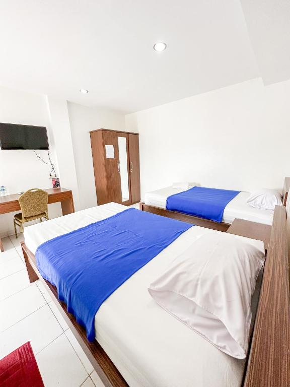 Letto o letti in una camera di Pillow Guest House