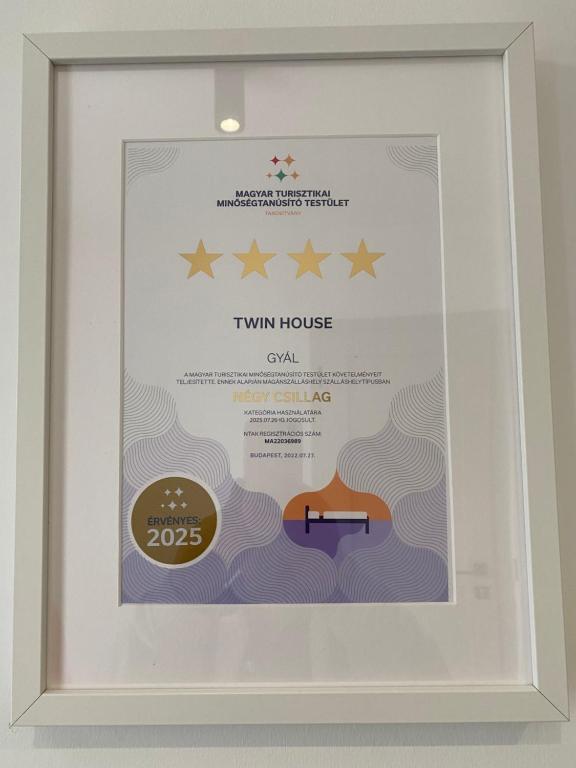 Certifikát, hodnocení, plakát nebo jiný dokument vystavený v ubytování TWIN HOUSE