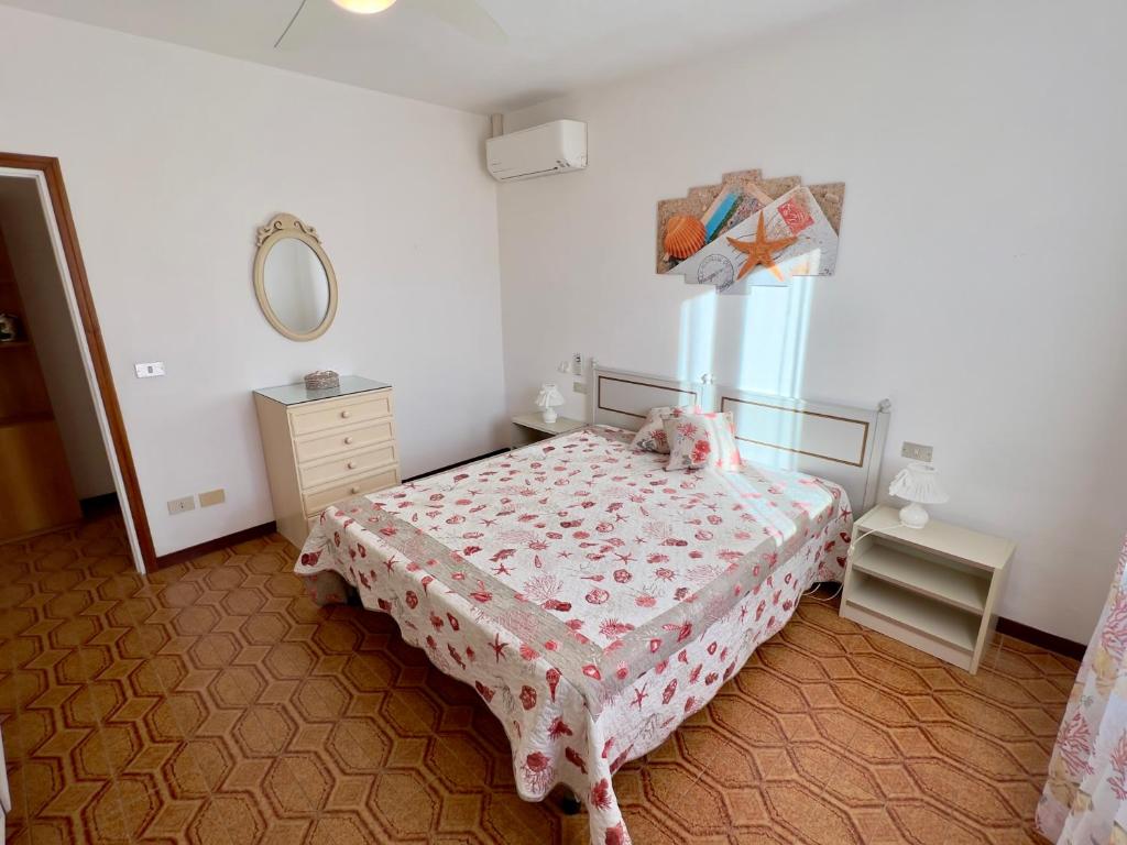 Postel nebo postele na pokoji v ubytování Appartamenti Via Roma 41