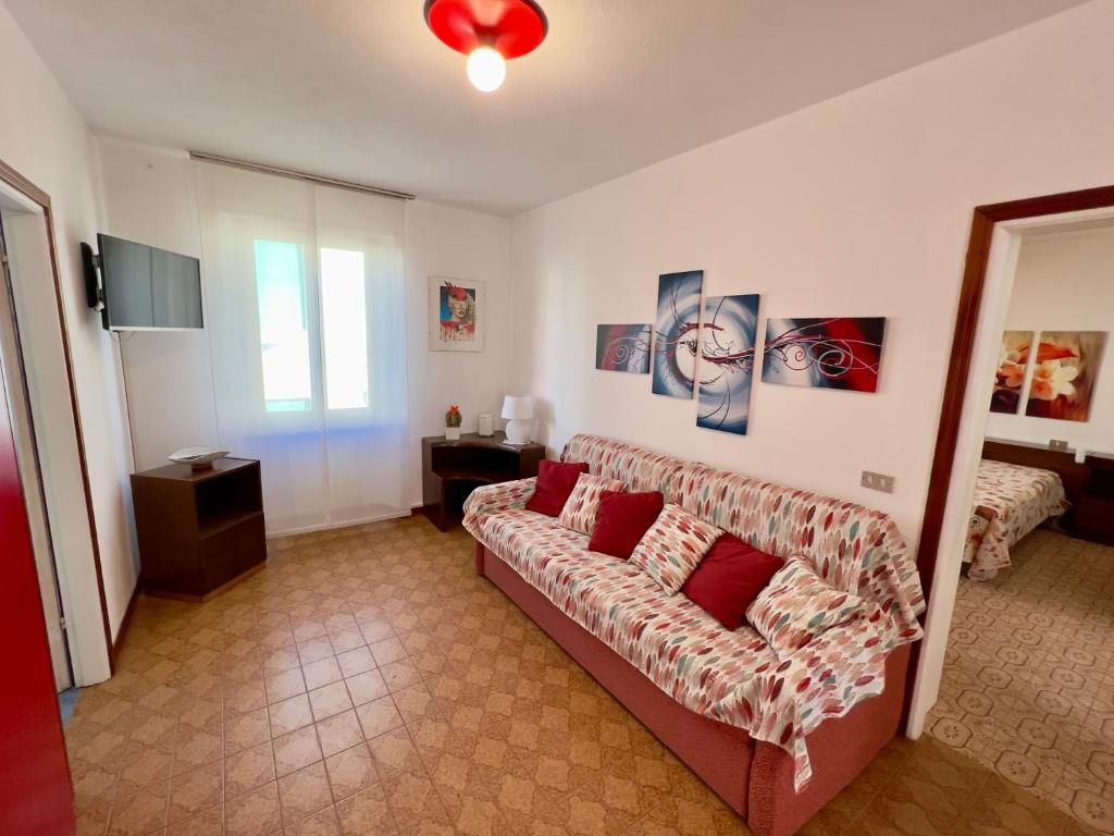 Postel nebo postele na pokoji v ubytování Appartamenti Via Roma 41