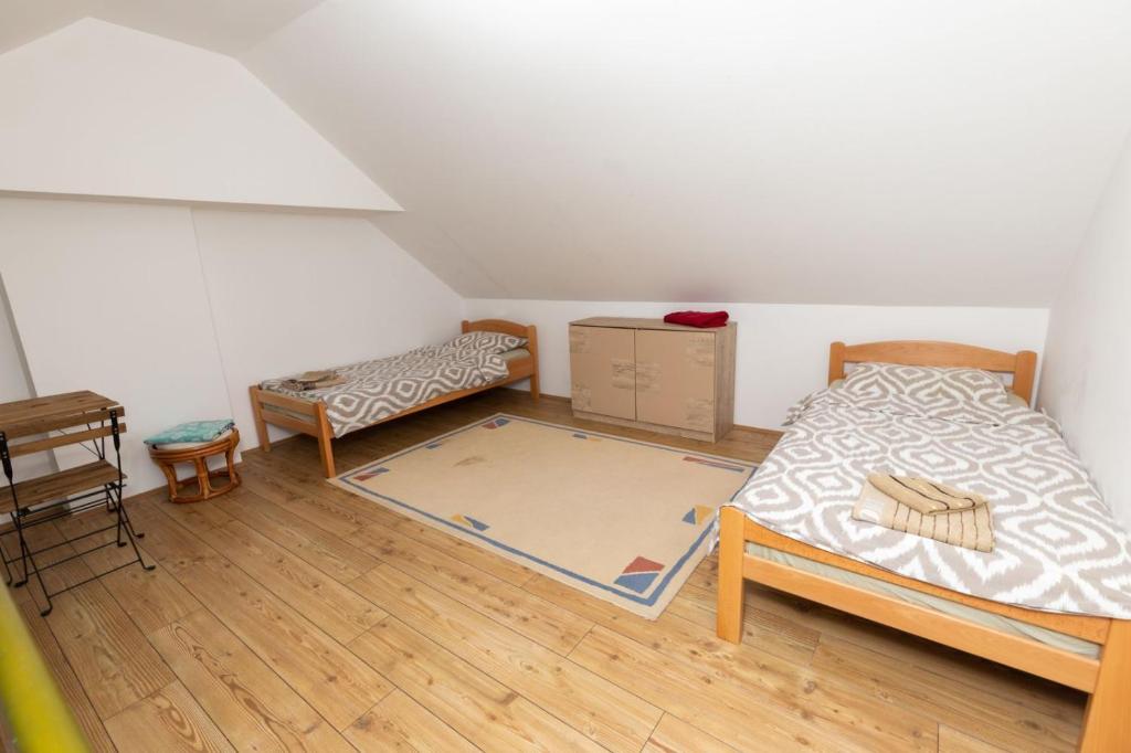 Postel nebo postele na pokoji v ubytování Apartman Sunce Zova