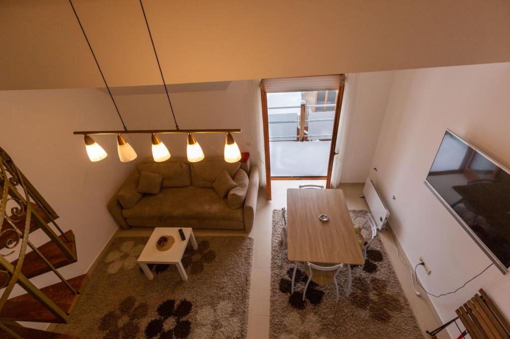 TV a/nebo společenská místnost v ubytování Apartman Sunce Zova