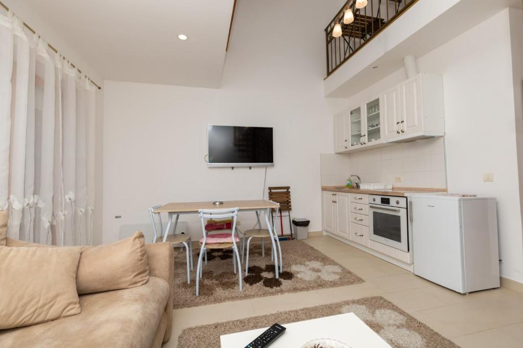 Kuchyň nebo kuchyňský kout v ubytování Apartman Sunce Zova