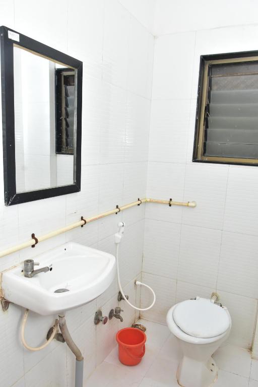 Koupelna v ubytování Hotel sai dhyan