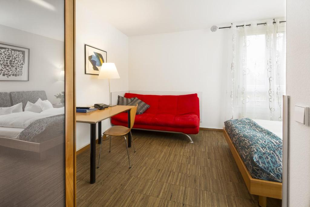 Postel nebo postele na pokoji v ubytování Business & Art Hotel Markgraf