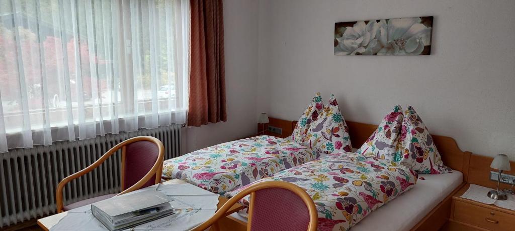 Postel nebo postele na pokoji v ubytování Pension Wildental