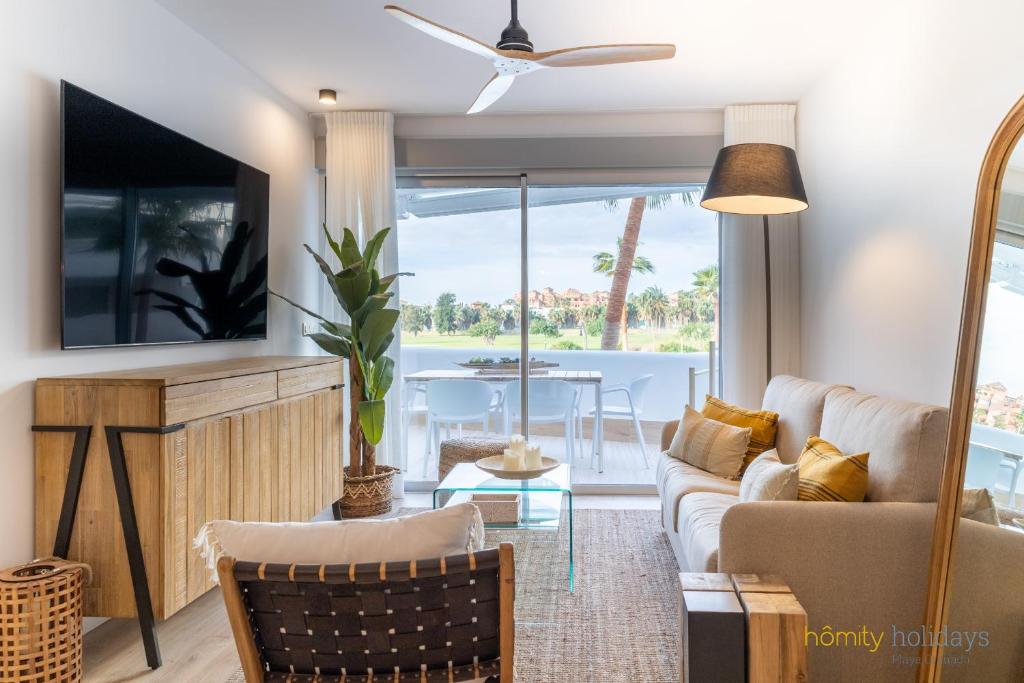 TV a/nebo společenská místnost v ubytování Homity Holidays - Playa Granada - Mar de Astrid