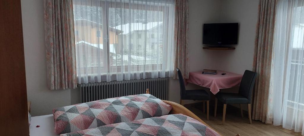 Postel nebo postele na pokoji v ubytování Pension Wildental