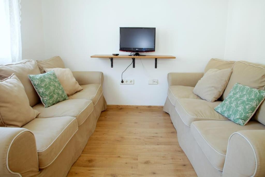 Posezení v ubytování Mirador de Sant Llorenç · Acogedor apartamento 6p
