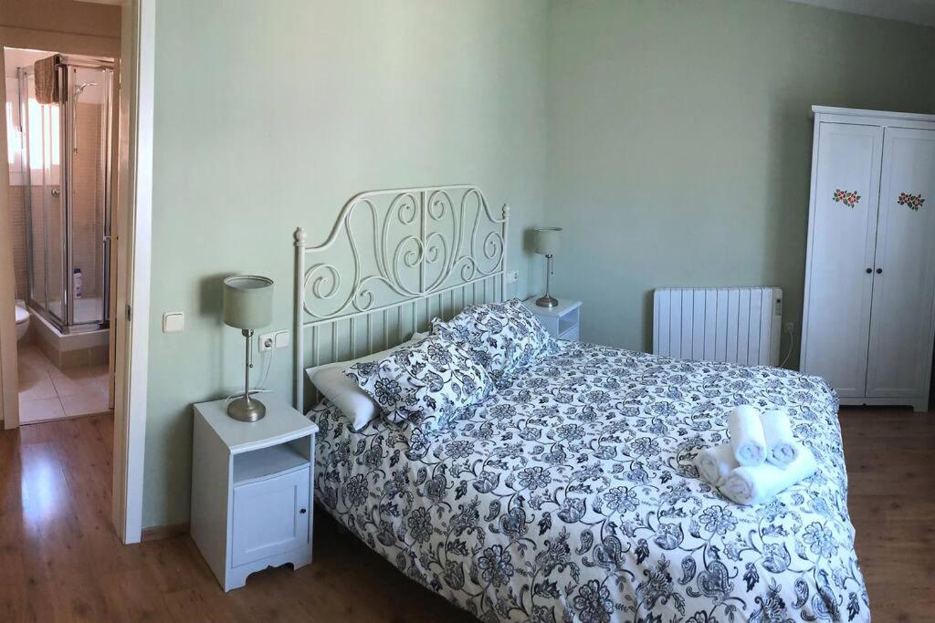 Postel nebo postele na pokoji v ubytování Mirador de Sant Llorenç · Acogedor apartamento 6p