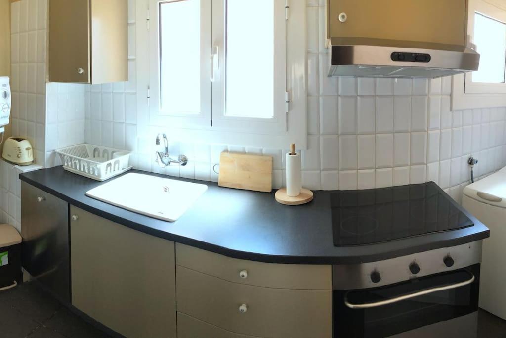 Kuchyň nebo kuchyňský kout v ubytování Mirador de Sant Llorenç · Acogedor apartamento 6p