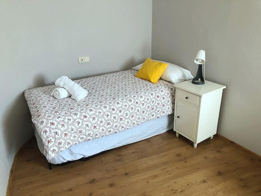 Postel nebo postele na pokoji v ubytování Mirador de Sant Llorenç · Acogedor apartamento 6p
