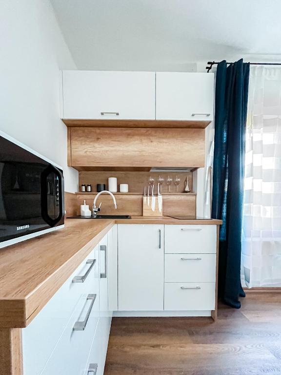 A kitchen or kitchenette at Ligeti Bástya Vendégház